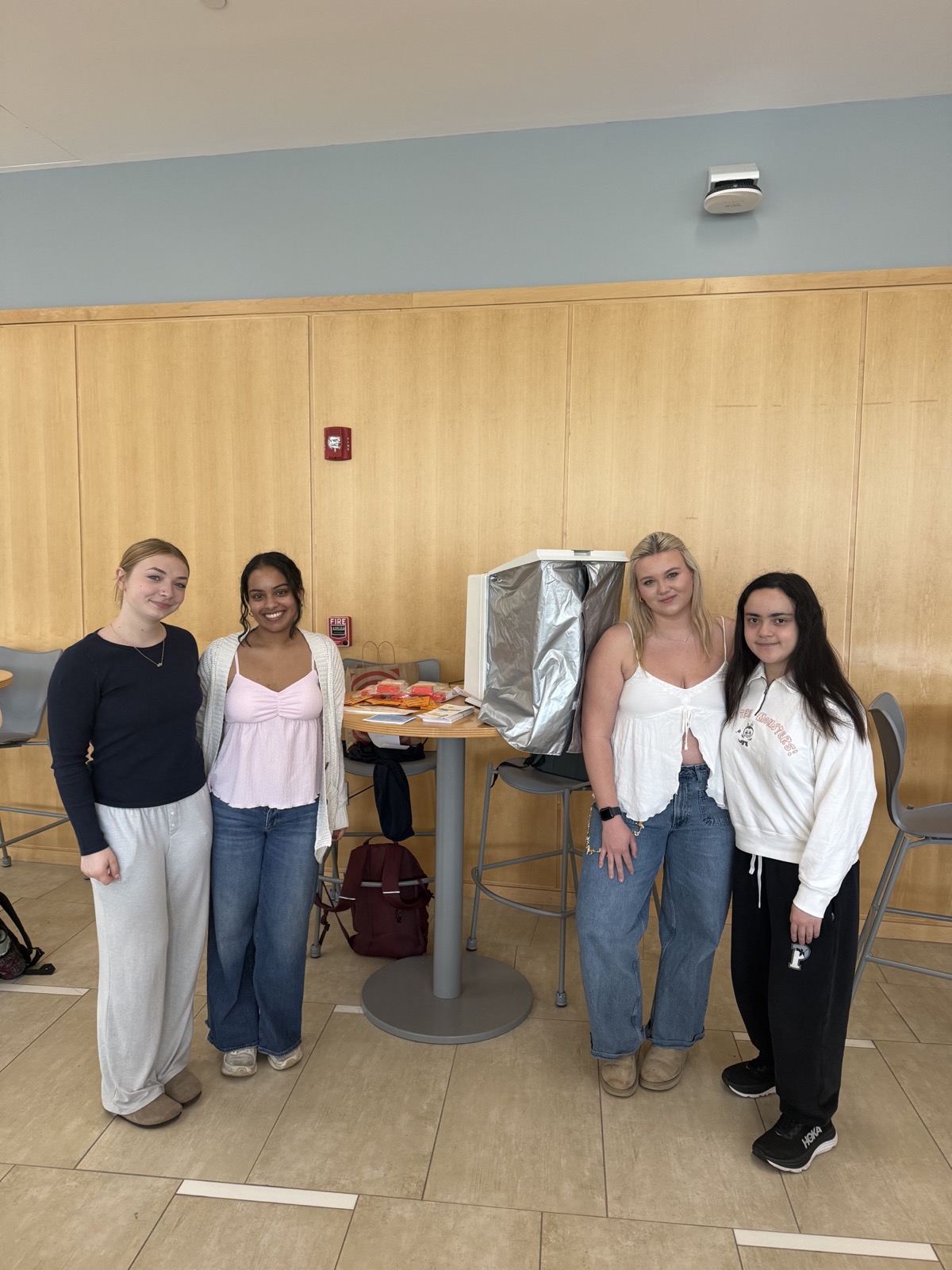 PhASEd students gathered at a campus skin-health education event